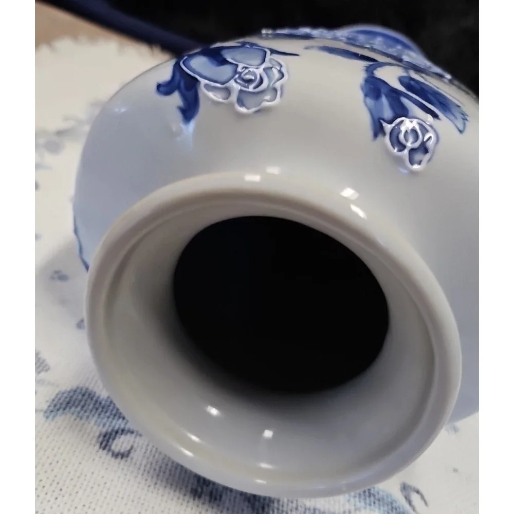 Blue and White Vase with Roses, Roses are outlined in the pottery so they show